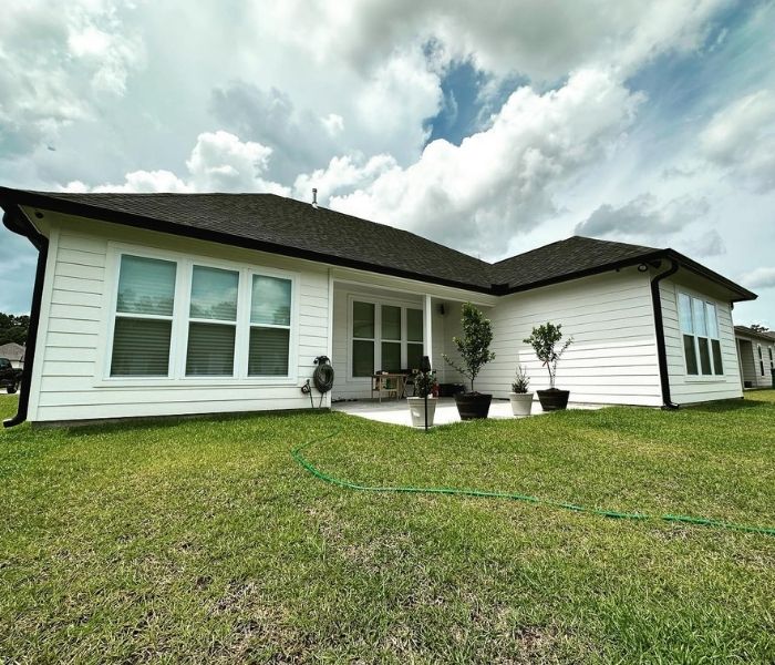 Black Gutters with 12 in Downspouts Photos